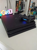 Console PlayStation 4 PS4 Pro 1Terabyte Preto Seminovo + 2 Controles + 5 Jogos
